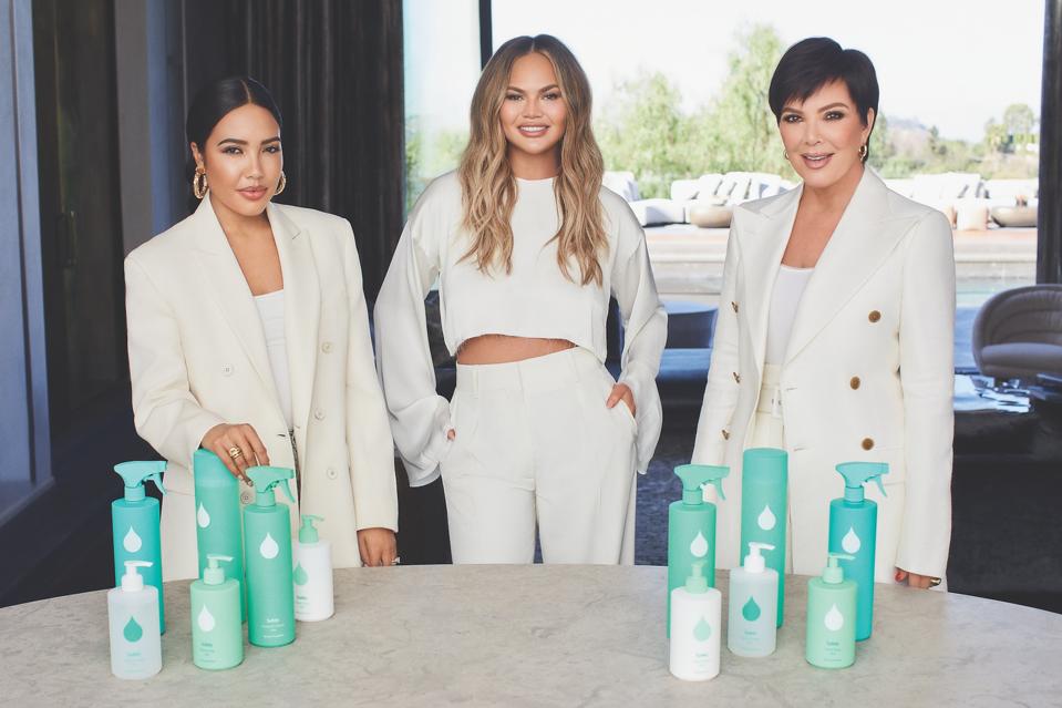 From left to right: Emma Grede, Chrissy Teigen, Kris Jenner with Safely products